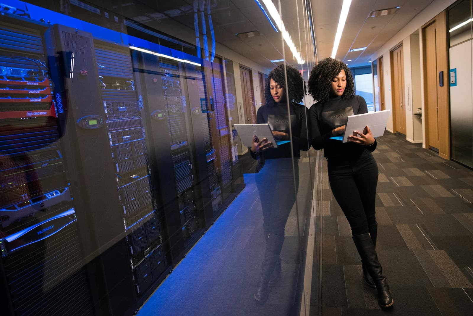 Black professional working in a modern technology environment